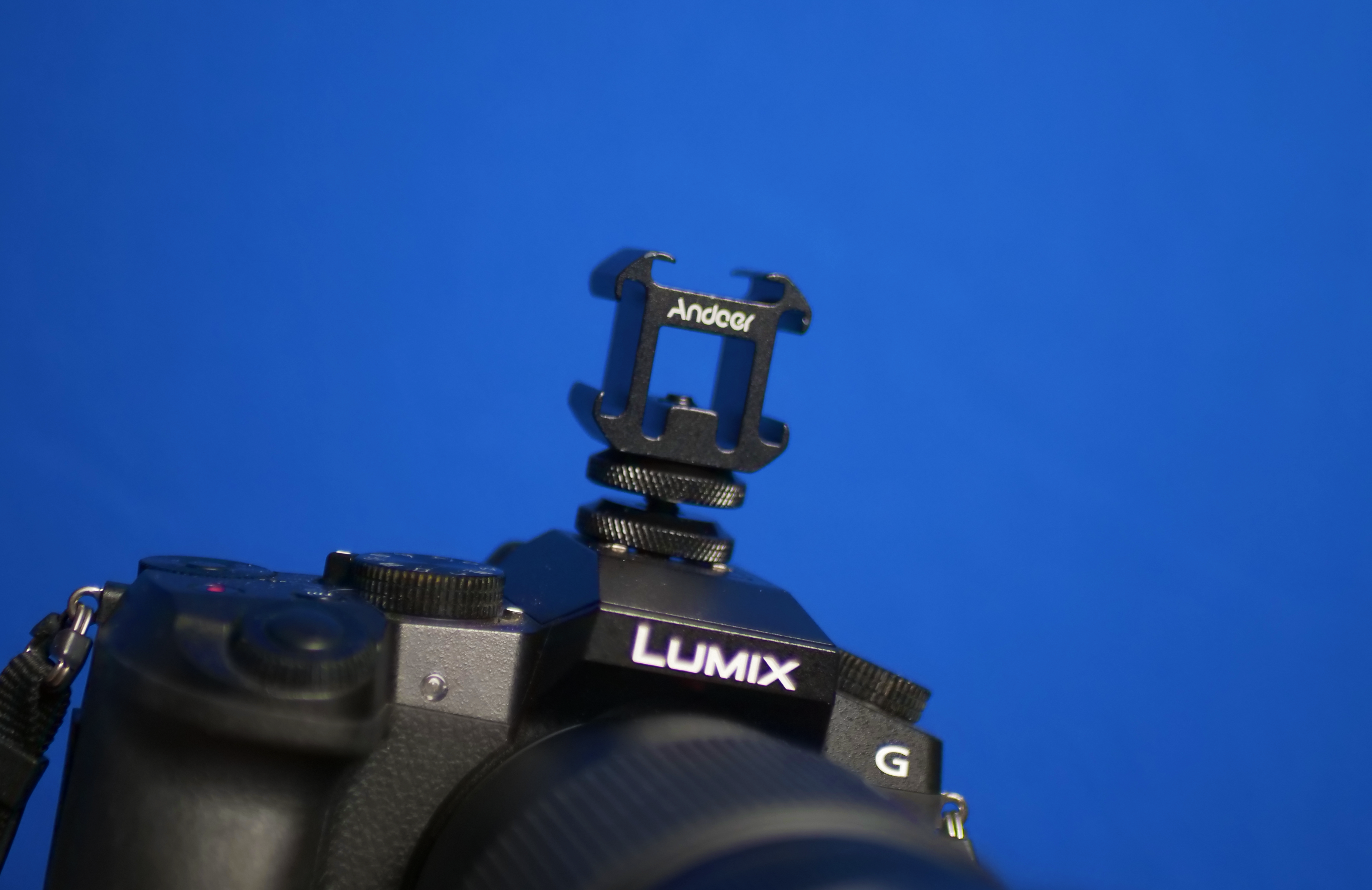 Adaptateur à triple griffe flash avec double vis de fixation